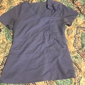 Periwinkle colored scrub top